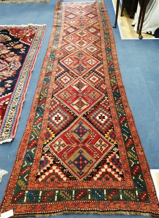 A Turkish geometric runner 370 x 95cm